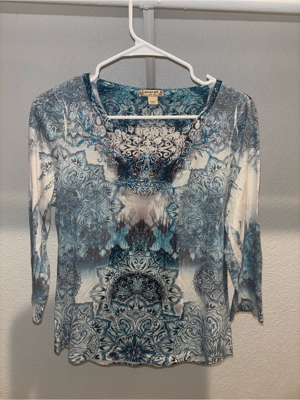 Energe blue and white floral print top with rhinestones 
Size medium